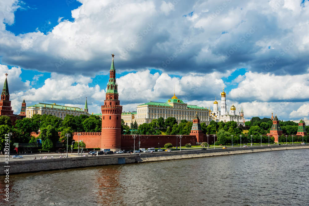 The Moscow Kremlin and the Moscow river on a warm summer day against a stormy sky