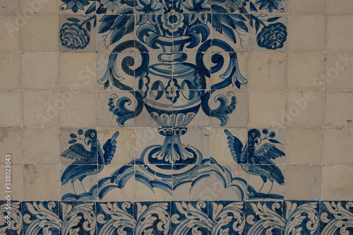 Original old blue tiles called azulejos in Coimbra, Portugal.