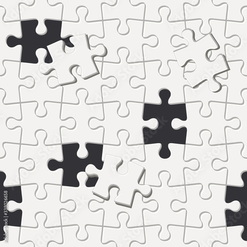 Vector seamless pattern with jigsaw puzzle with missing pieces.