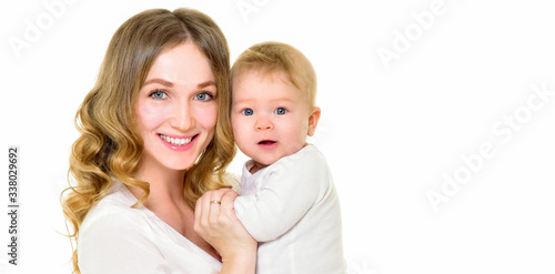 Mother and baby playing and smiling. Happy family.
