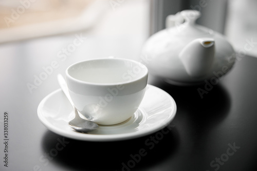 Fototapeta Naklejka Na Ścianę i Meble -  Cup of tea with teapot