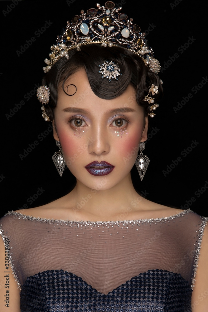 Fotografie The ancient goddess in the black background