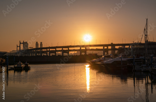 Sunset at Gwangan Bridge and the yacht dock in Busan  South Korea