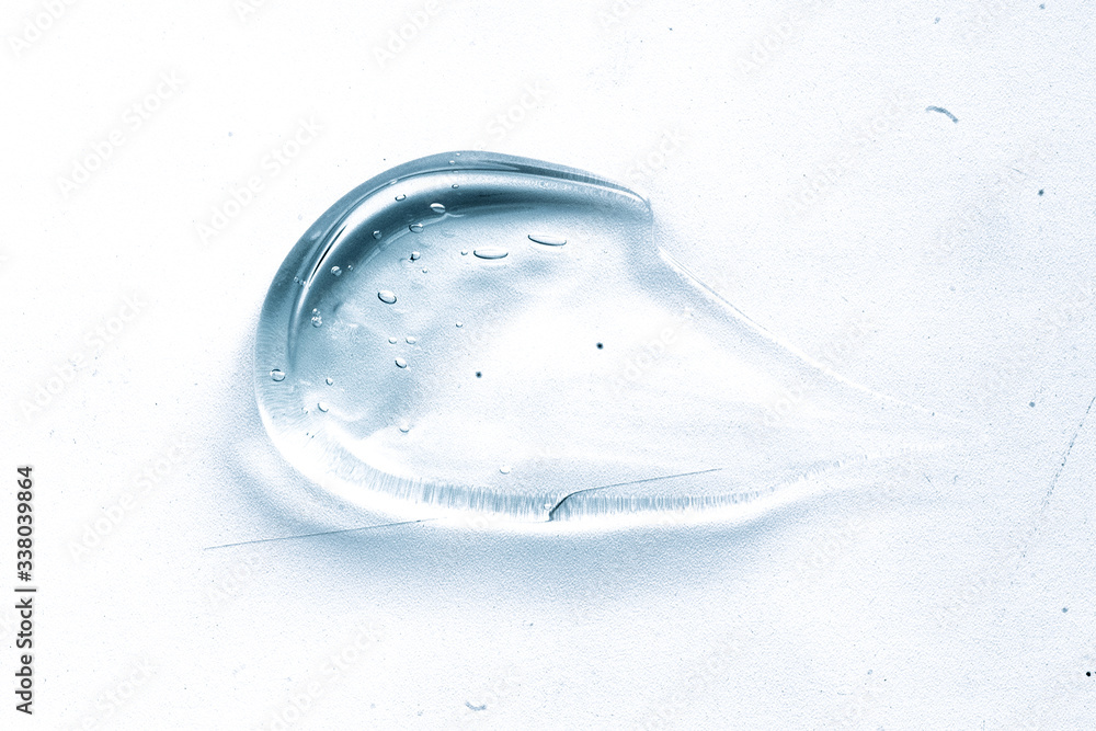 Transparent liquid gel cream smudge on white background Transparent liquid gel cream smudge on white background