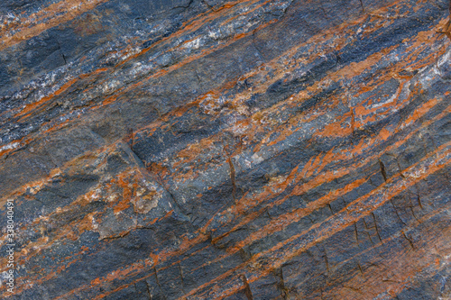 Photos Texture of the stone with layers of iron ore