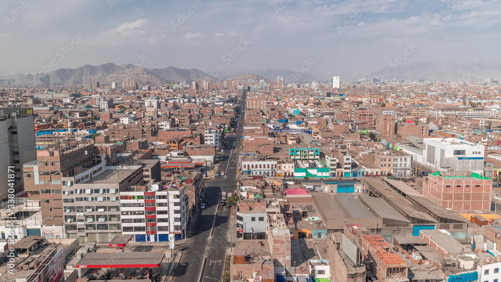 Panoramic skyline of Lima city from above with many buildings aerial timelapse. Lima, Peru