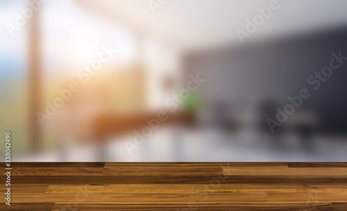 Empty interior with large window. Retro light bulb. The floor is of brown parquet. 3D rendering. wooden table. blurred background