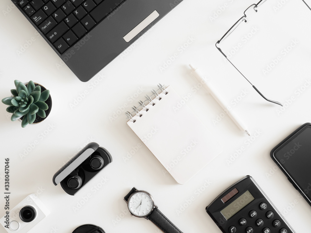 top view of work from home concept with keyboard, calculator and notebook on white background, graphic designer, Creative Designer concept. top view of work from home concept with keyboard, calculator and notebook on white background, graphic designer, Creative Designer concept.