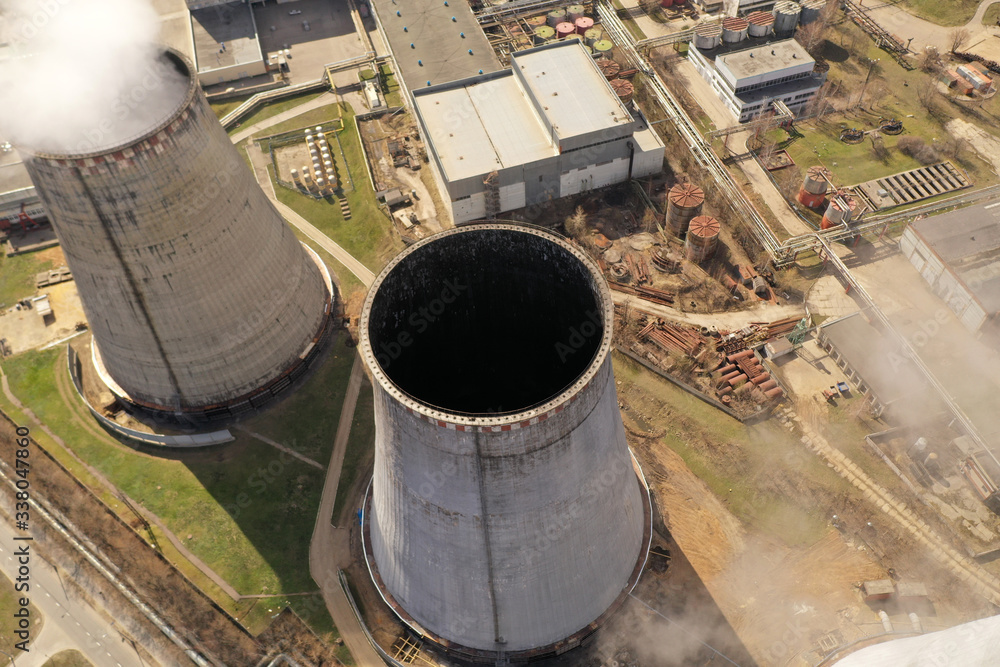 industrial panoramic landscape with chimneys filmed from a drone