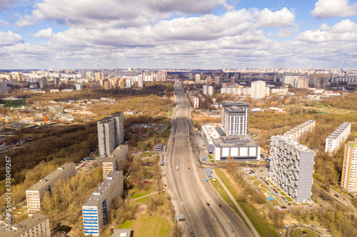 urban panoramic views with motorways and buildings taken from a drone © константин константи