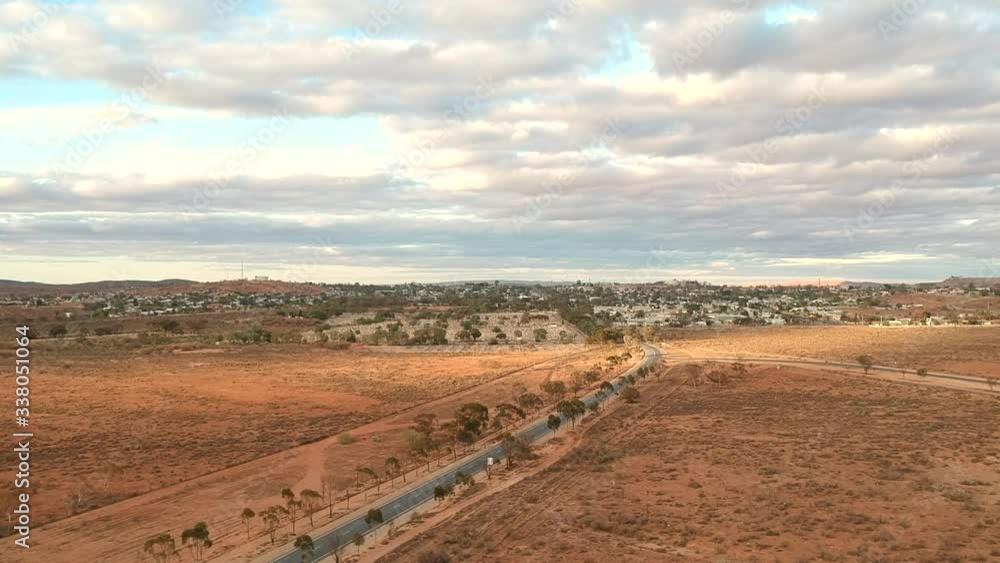 Golden sun sets across the outskirts of Broken Hill in outback Australia Golden sun sets across the outskirts of Broken Hill in outback Australia