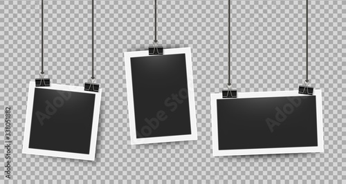 Realistic photo frames clipped on ropes. Retro 3D picture frame on white border for cameras photography. Vector illustration blank photoframe set on transparent background