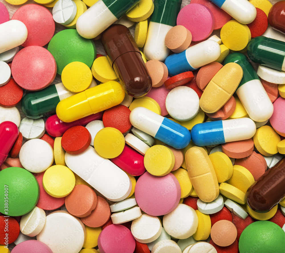Medicines for treatment. Pills and capsules top view. Medicines for treatment. Pills and capsules top view.