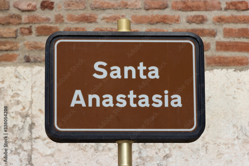 Fototapeta premium The Santa Anastasia sign at the entrance to the Basilica di Santa Anastasia in the old part of the city of Verona in Italy