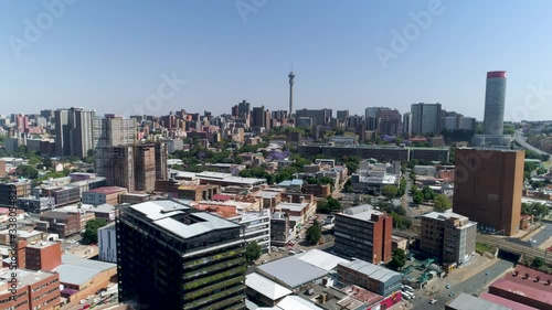 An aerial view of the Johannesburg skyline as seen from above the Maboneng district on a bright sunny day.