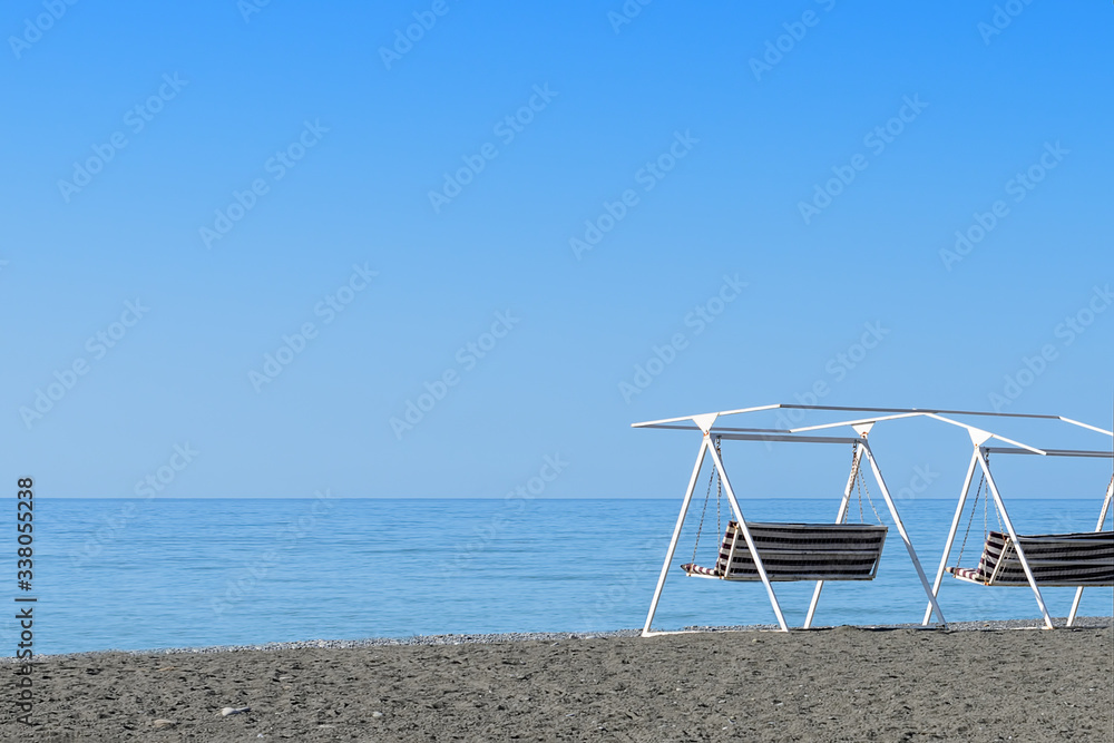 Empty sea beach without people during the covid-19 virus epidemic in 2020. The image has a place for your text. Empty sea beach without people during the covid-19 virus epidemic in 2020. The image has a place for your text.