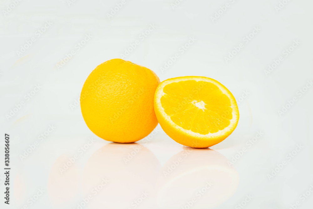 Orange fruit isolated on white background . Healthy food. orange with green leaf isolated on white background. Orange fruit isolated on white background . Healthy food. orange with green leaf isolated on white background.