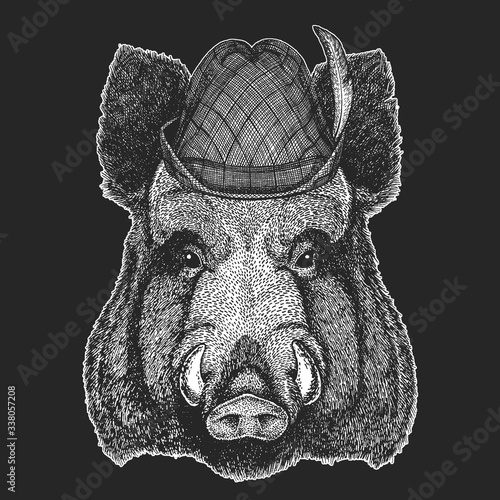 Portrait of wild hog, boar, pig. Oktoberfest. Tirol traditional hat. Beer festival. Face of brave animal.