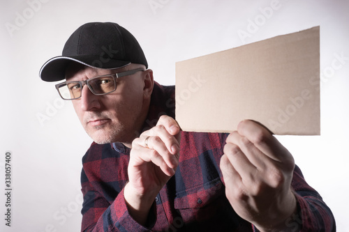 A man with an empty paper i...