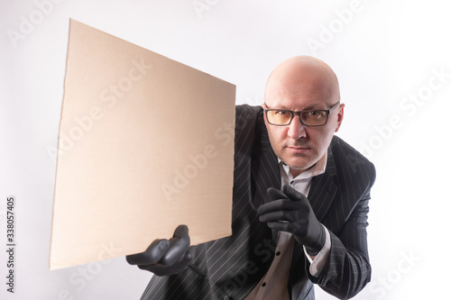 Adult man with a poster in ...
