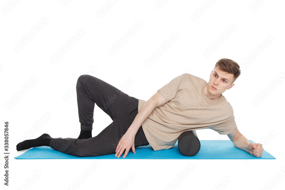Handsome man shows exercises Handsome man shows exercises