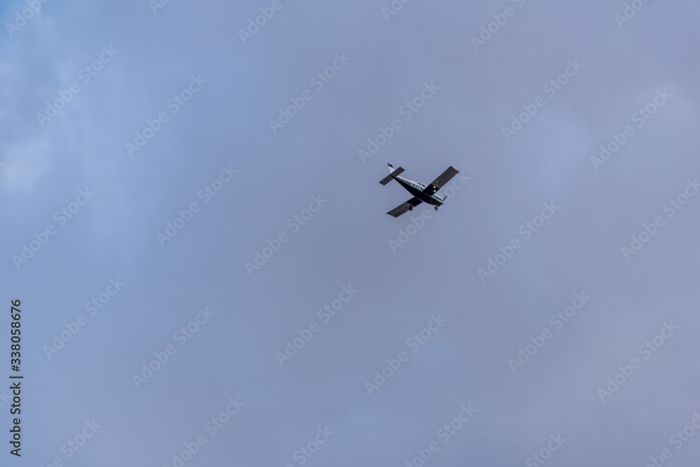 Small Private Prop Plane Flying in the Sky Small Private Prop Plane Flying in the Sky