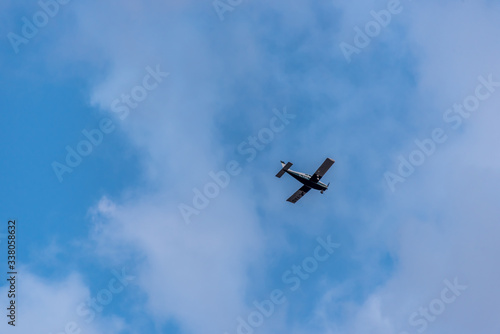 Small Private Prop Plane Flying in the Sky