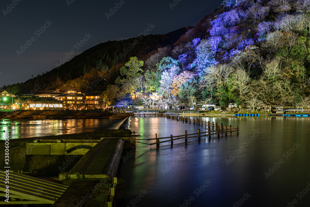 the night view of the river in the Arashiyama region of Kyoto, Japan.