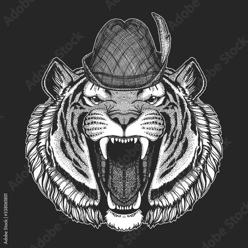 Tiger portrait. Oktoberfest. Tirol traditional hat. Beer festival. Wild cat head.