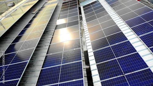 The sun on several solar panels to produce new energy