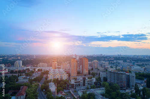 Sunset sky over a city. Ukraine, Kiev. A view of one of the central parts of the city from a height of 28 floors.