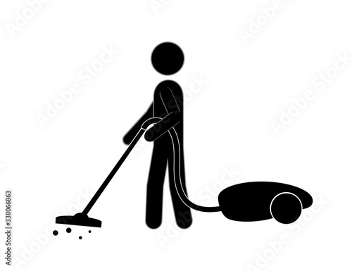 A man with a vacuum cleaner does the cleaning of the house. Cleanliness and health.