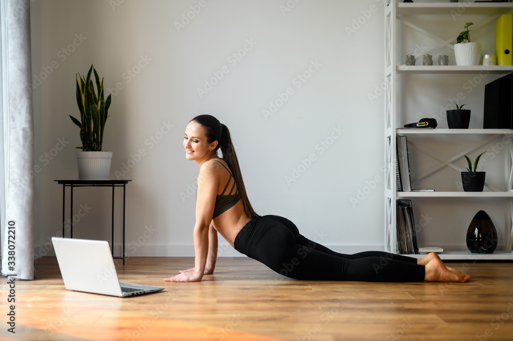 Female yoga coach records video tutorial Female yoga coach records video tutorial
