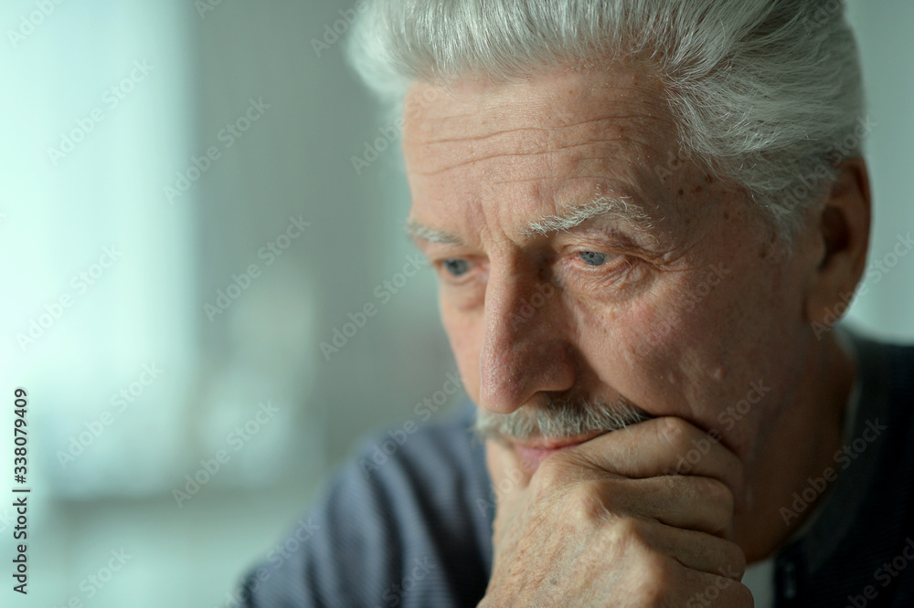 Close up portrait of thoughtful senior man Close up portrait of thoughtful senior man