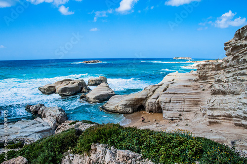 A fresh spring wind drives the waves to the coast of Cyprus. The Mediterranean Sea is painted with dark ultramarine and a luminous azure from the inside. 