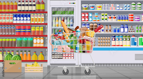 Supermarket store interior with goods. Big shopping mall. Groceries shop. Inside of super market. Cart full of food. Grocery, drinks, fruits, dairy products. Vector illustration in flat style © absent84