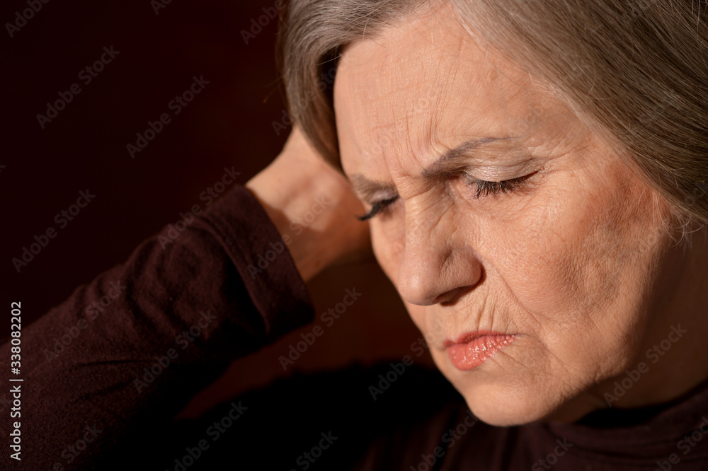 Obraz premium Close up portrait of sad senior woman