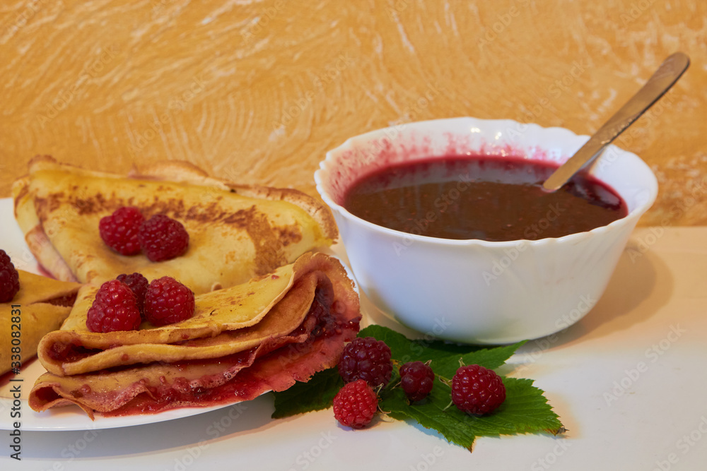 pancakes with raspberry jam,pancakes breakfast on a plate with jam pancakes with raspberry jam,pancakes breakfast on a plate with jam