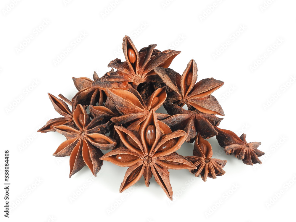 Heap of dried star anise with seeds inside closeup isolated on white background. Spice for cooking and medicinal herb. Heap of dried star anise with seeds inside closeup isolated on white background. Spice for cooking and medicinal herb.