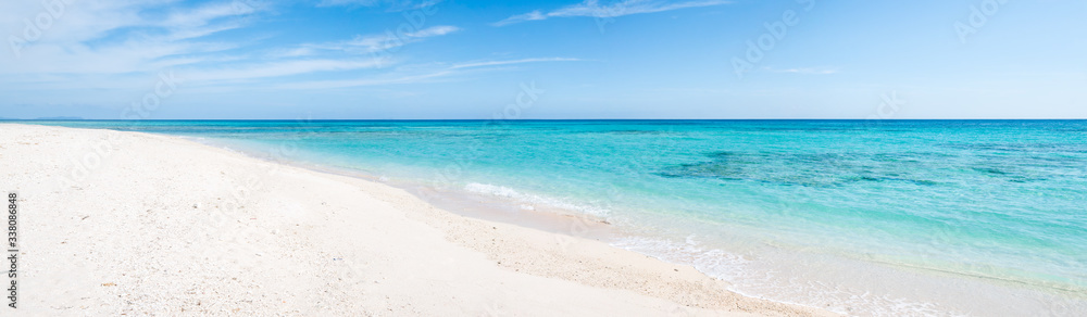Beach panorama with turquoise water and white sand