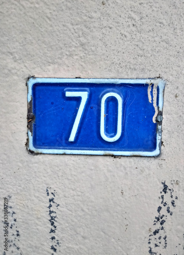 number seventy on a wall