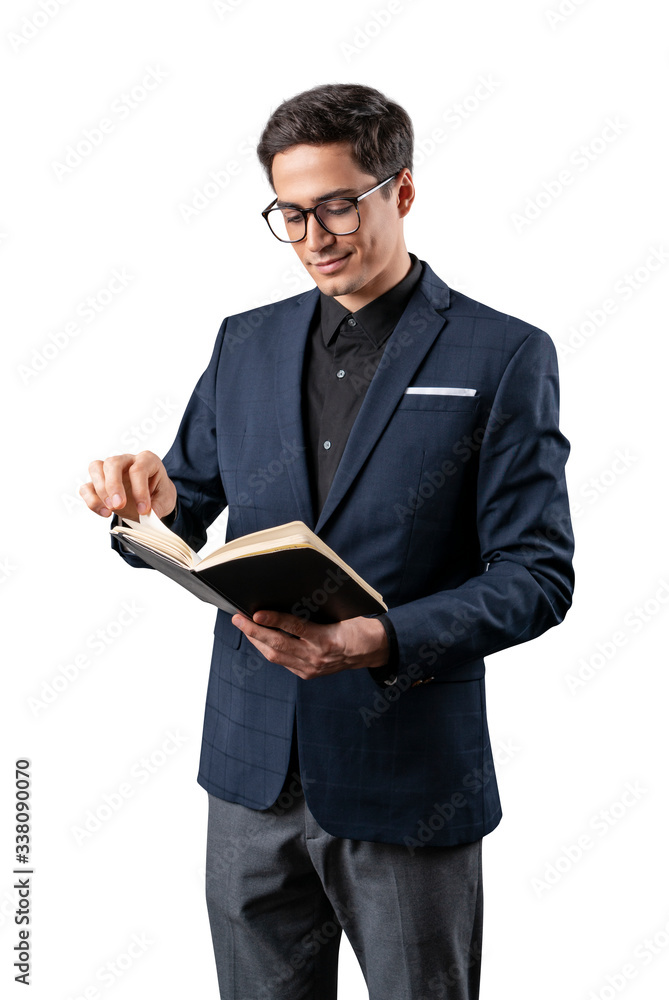 Standing handsome man in glasses reading book. Isolated Standing handsome man in glasses reading book. Isolated