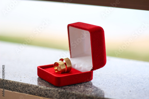 Wedding rings on red velvet box. Wedding concept.  © Appreciate