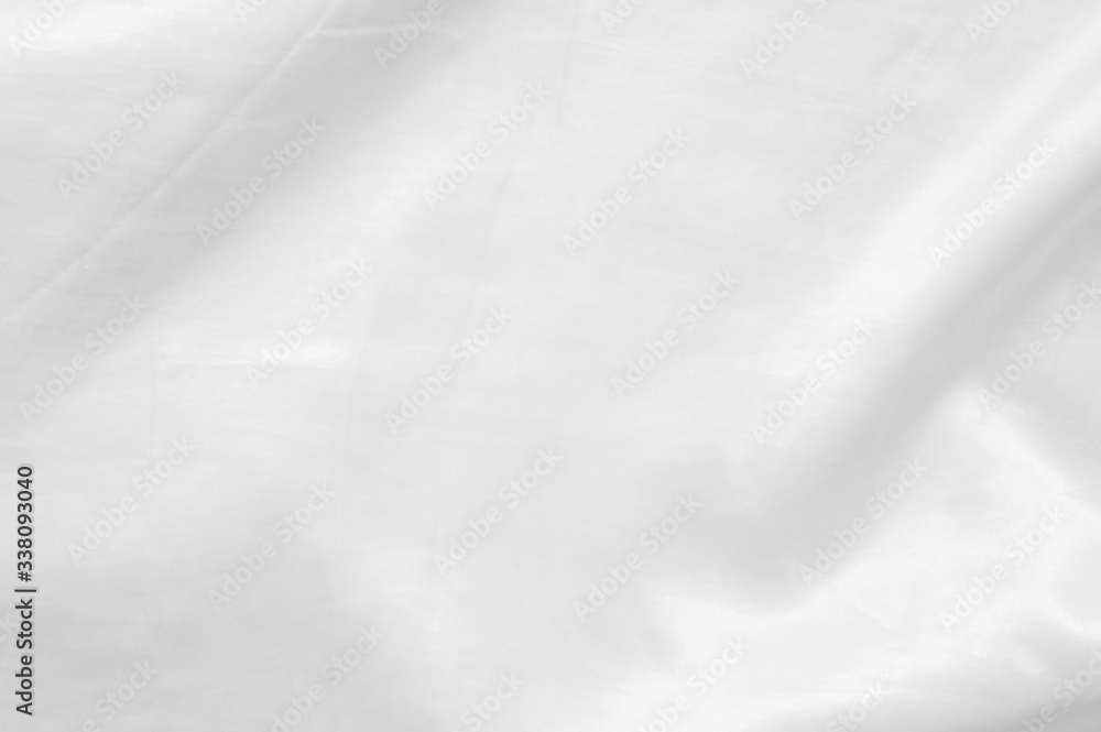 Abstract crumpled white and gray colors fabric texture background,rippled white silk fabric Abstract crumpled white and gray colors fabric texture background,rippled white silk fabric