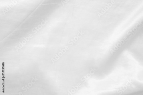 Abstract crumpled white and gray colors fabric texture background,rippled white silk fabric