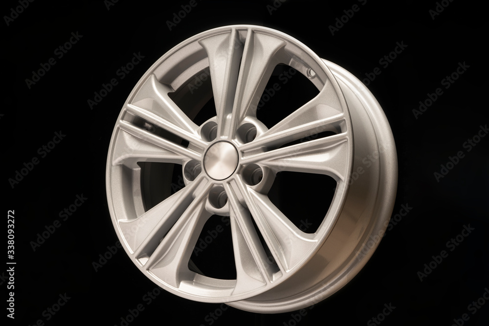 new aluminum alloy wheel, silver color on a black background