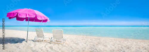 Beach panorama with sun chair and parasol as background image