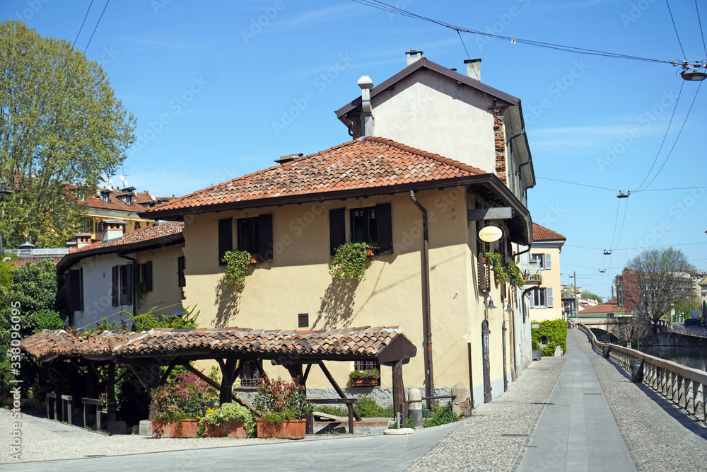 Italy , Milan - Vicolo dei Lavandai ( ancient public washrooms ) Navigli Canals Downtown of the city empty of people during n-cov19 Coronavirus outbreak epidemic quarantine home