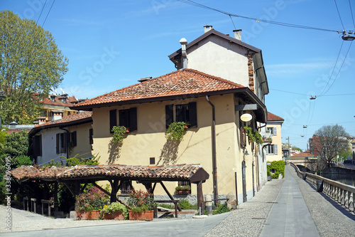 Italy , Milan - Vicolo dei Lavandai ( ancient public washrooms ) Navigli Canals  Downtown of the city empty of people during n-cov19 Coronavirus outbreak epidemic quarantine home  photo