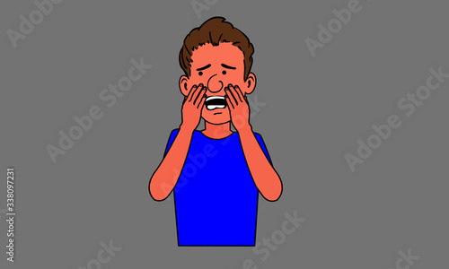 The young man grasped his face,anxiety expression.